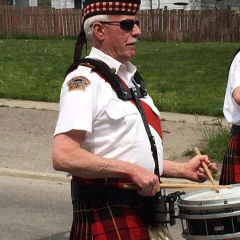 Taking it to the streets
Drum Corporal N. Craig keeps the section in line